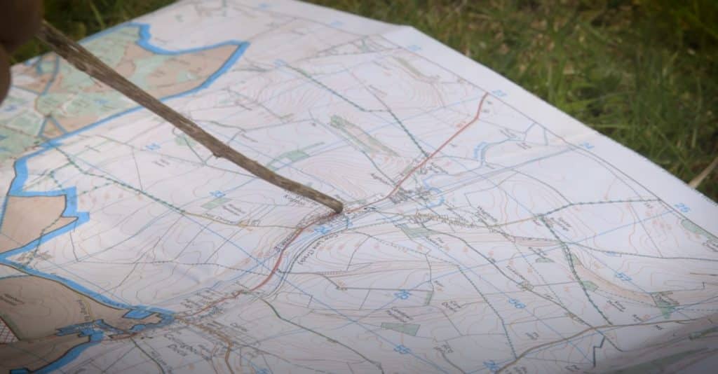 Reading A Map With A Flashlight